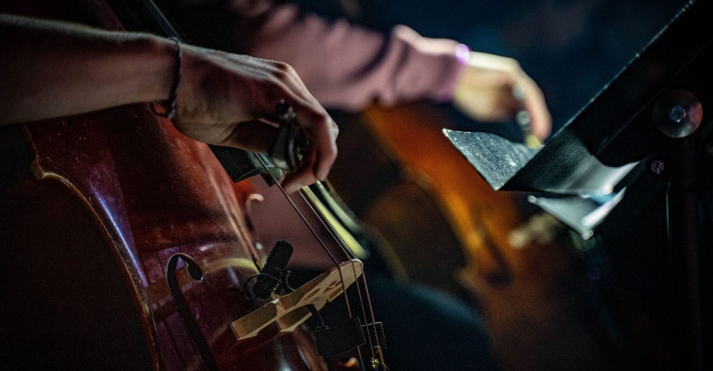 A performer playing the cello
